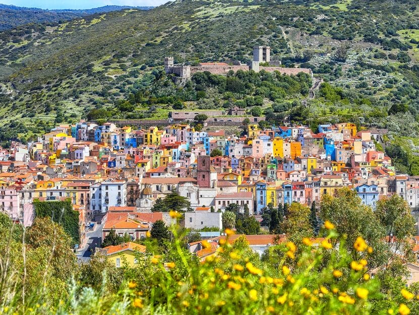 Wonderful morning panorama of colourful houses of old town Bosa in Sardinia